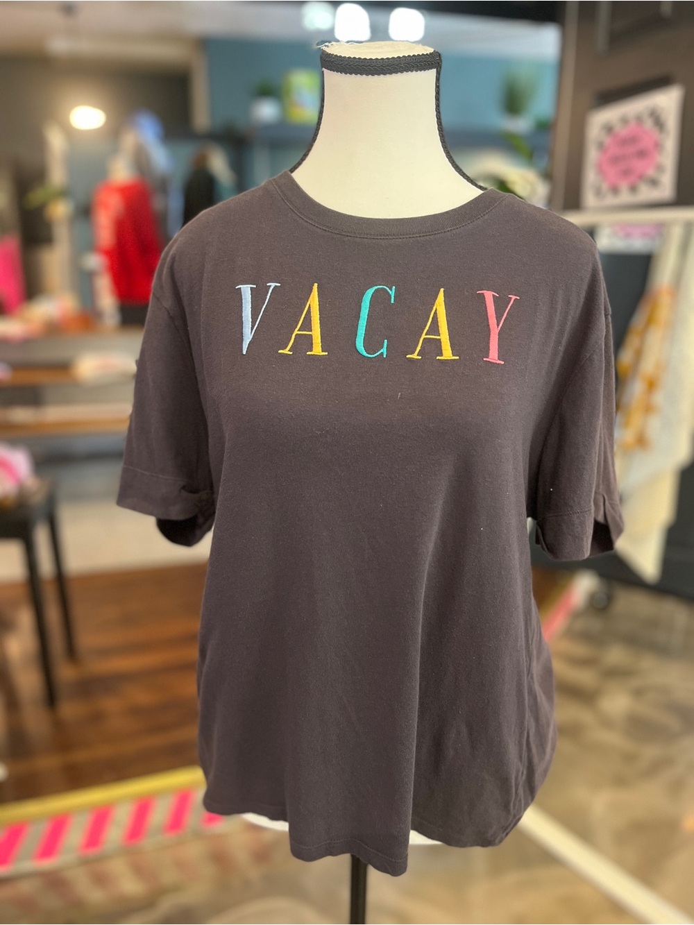 Revolution Black Tee with White Circular Logo Print